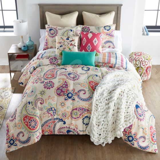 Cali Comforter Bedding Set with coordinating decor pillows in a bedroom setting. 