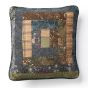 This pillow has a patchwork design of the various fabrics used in the quilt.