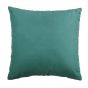 The back of the pillow is a solid teal.