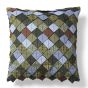 This roof tile pillow contains coordinating fabrics that match the quilt.