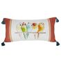 This pillow has tassels and features five colorful birds perched on a branch.