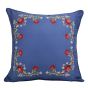 This decorative pillow is blue with delicate flower details.