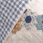 Detail image shows the gingham reverse plaid design and Quilt design.