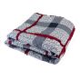 This quilt has has a classic geometric patchwork pattern.