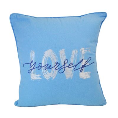 The front of this decorative pillow is blue and says "Love yourself".