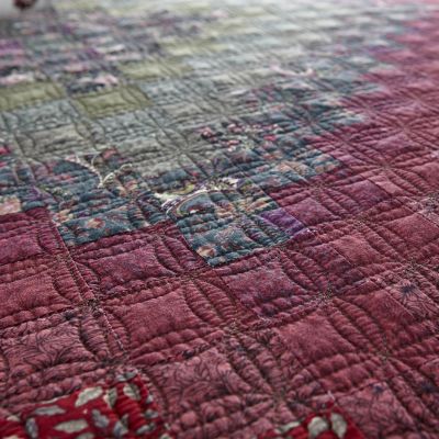 Spice Trip features a simple traditional quilt pattern.