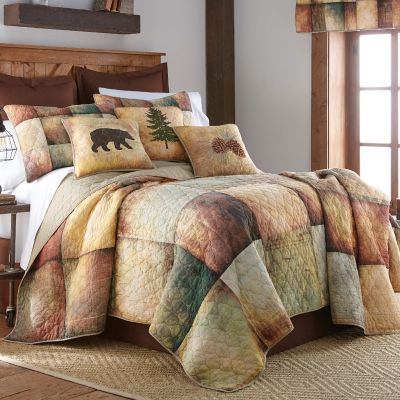 The Wood Patch quilt incorporates large printed panels that resemble blocks of wood.