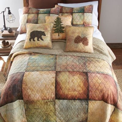 The Wood Patch quilt incorporates large printed panels that resemble blocks of wood.