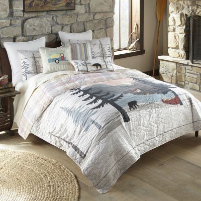 Lake Retreat Quilted Bedding Set displayed in a lodge themed bedroom. 