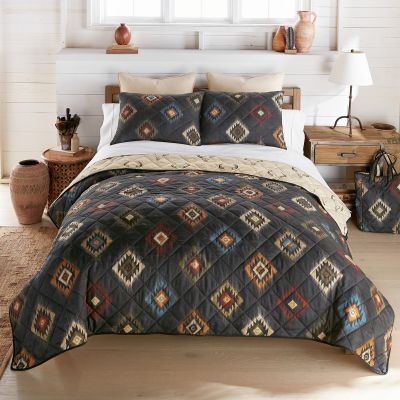 Phoenix Quilted Bedding Set from Your Lifestyle by Donna Sharp is a Southwest Pattern in a combination of charcoal, ivory, brick red, olive, bronze, and blue grey. Coordinating Decor pillows are sold separately.