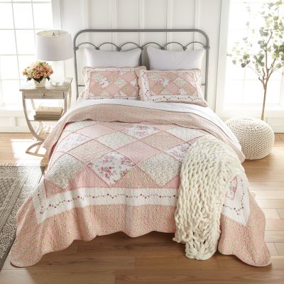 Strawberry Garden Quilt Set in hues of pink, white and green. 