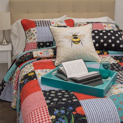Wild One Patch Cotton Pieced Quilt with matching shams. Coordinating Decor Pillow Set sold separately.