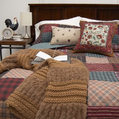 Appalachia Plaid Pieced Cotton Quilt Set with coordinating accessories. Quilt Set includes 1 quilt and two coordinating shams. Accessories sold separately.