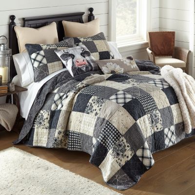 Augusta Cotton Quilt Set from Your Lifestyle by Donna Sharp is a farmhouse design patchwork quilt set with two coordinating shams included. Coordinating euro shams and Decor pillow set, one cow and one floral are sold separately.