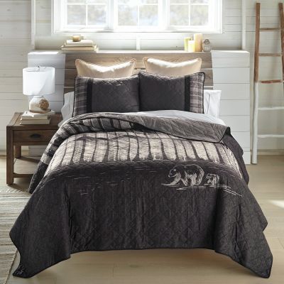 Nighttime Quilted Bedding Set by Donna Sharp includes a quilt and two shams.
