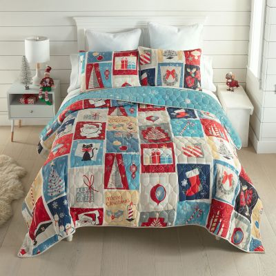 Twin bedding set includes one sham, featuring a vibrant design and reversible quilt for versatile bedroom décor. (This image shows bedding with two shams). Accessories sold separately.