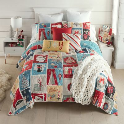 Retro Christmas Striped pillow in red and white candy cane colors with stripes of turquoise blue. 
