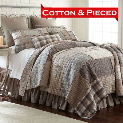 Cotton and Pieced quilt in smoky neutral tones. Perfect for contemporary or farmhouse styles. 