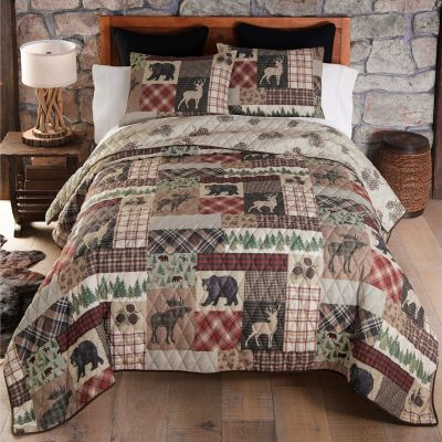 The wildlife motifs are arranged in a plaid patchwork.
