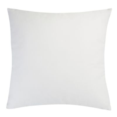 This decorative pillow adds texture to any room.