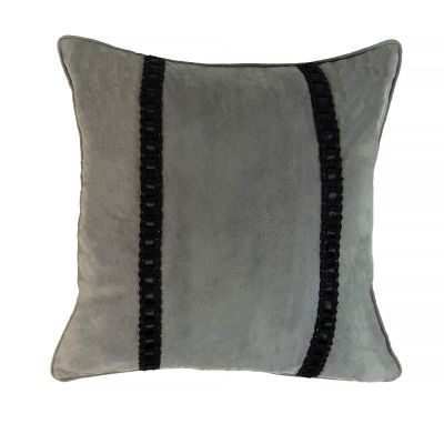 This square decorative pillow is grey with two decorative black accents.