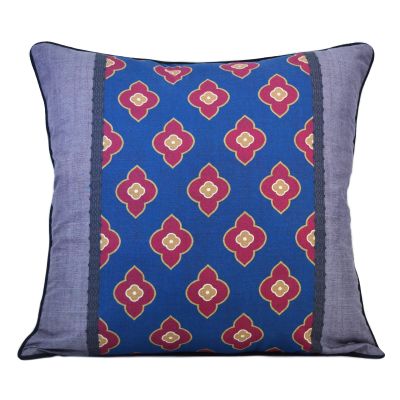 This matching floral-themed pillow continues the color scheme.