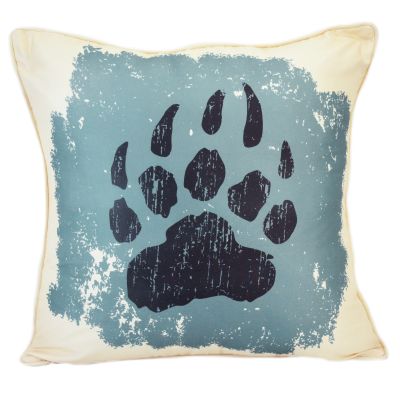 This decorative pillow features a bear paw print.