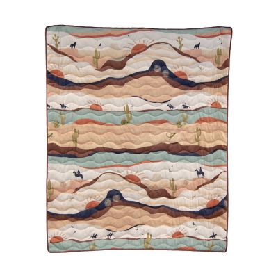 Journey coordinating throw depicts silhouettes of cowboys and wildlife on horseback on a desert background.