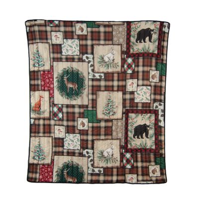 A matching throw from the Woodland Holiday collection, showcasing a cozy design with rustic woodland motifs, perfect for adding warmth and charm to your home decor.