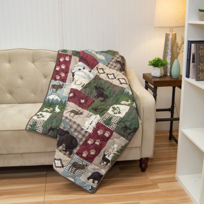 Lifestyle image of Montana Forest Quilted Bedding Set From Your Lifestyle By Donna Sharp Decorative Throw. 