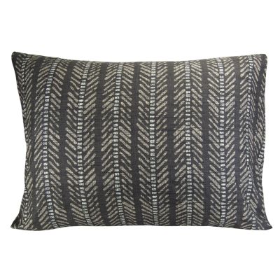 The Nomad comforter features geometric and linear shapes with a woven texture backdrop.