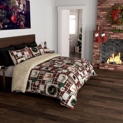 A comforter set from the Woodland Holiday collection, featuring rustic woodland motifs on a plaid background, perfect for creating a cozy and inviting atmosphere in your bedroom. Also shown coordinating decor pillows and chenille throw. Accessories sold s