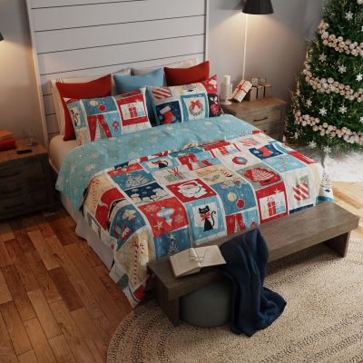 Image shows the Retro Christmas Bedding Collection, complete with matching accessories in a Christmas themed bedroom. 