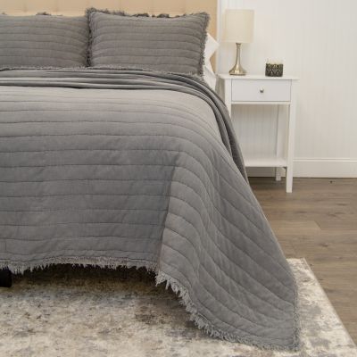The grey Delano quilt is a perfect neutral for any bedroom.