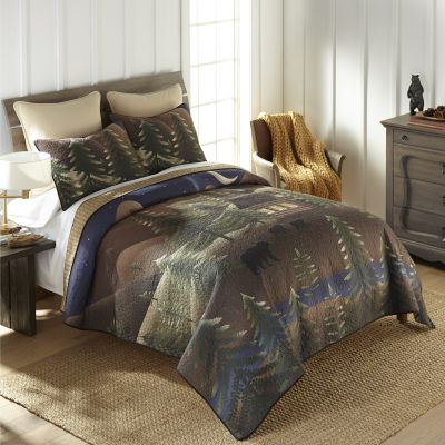 lodge design quilt in colors of navy, olive, black, wheat, walnut and yellow